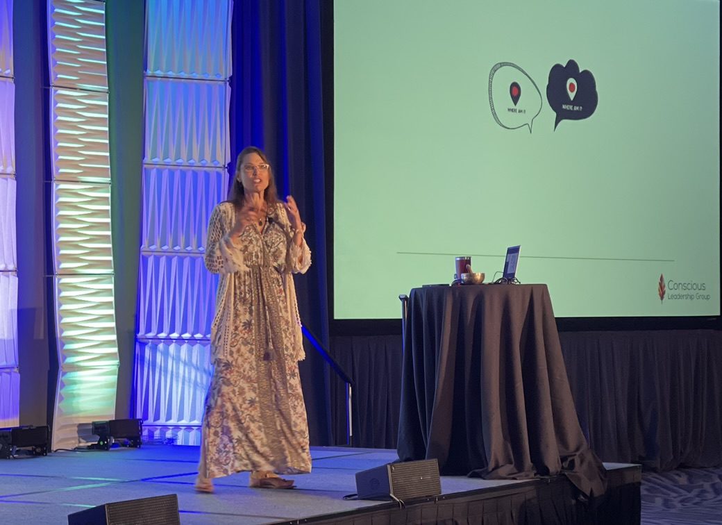 Patty delivering a keynote on stage