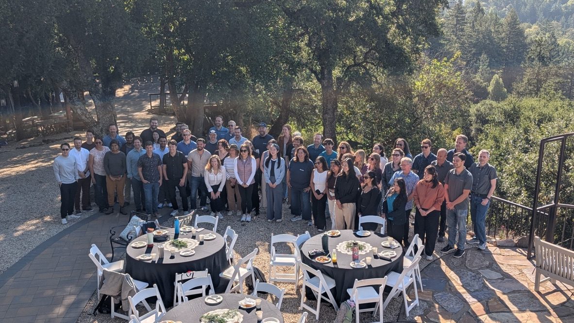 A team gathered outdoors at Living Well USA
